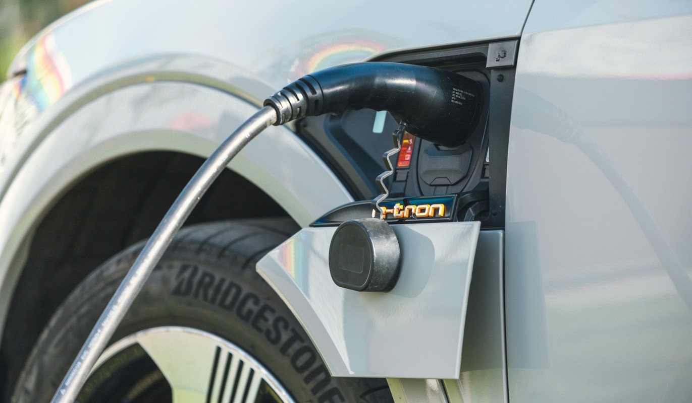 An electric vehicle being charged.