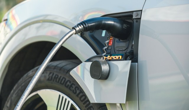 An electric vehicle being charged.