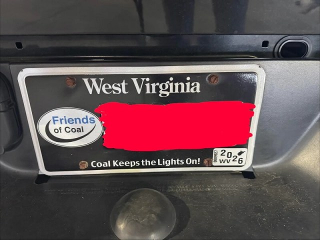 Truck with 'Coal Keeps the Lights On' plate
