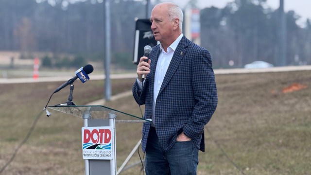 State Senator Jay Morris speaks into a microphone at a podium for the Louisiana Department of Transportation.