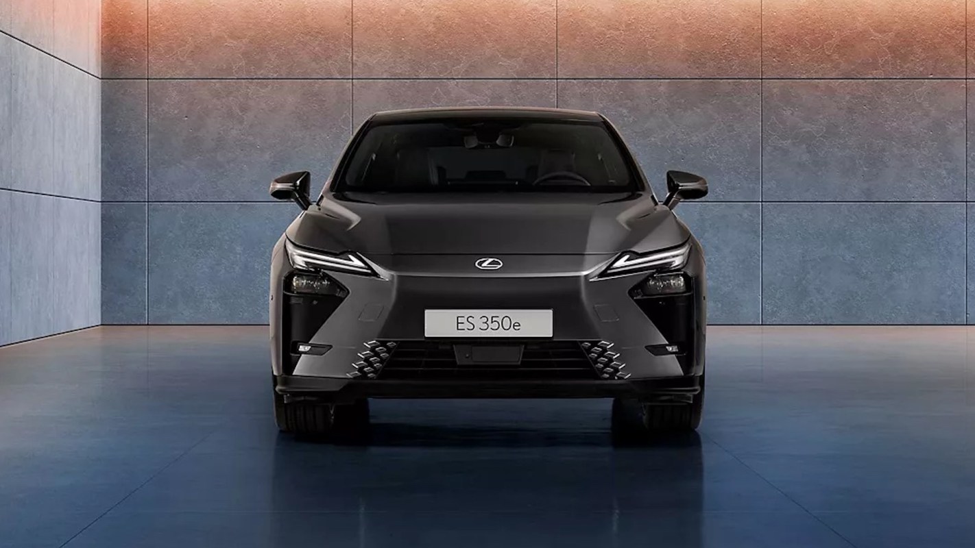A sleek black Lexus ES 350e in a showroom.