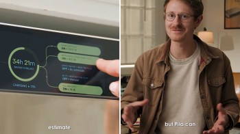 A man with glasses discusses energy usage while pointing at a digital display showing backup power and charging status.