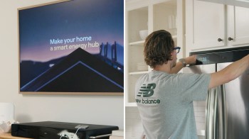 A man sets up a smart refrigerator while a TV displays "Make your home a smart energy hub."