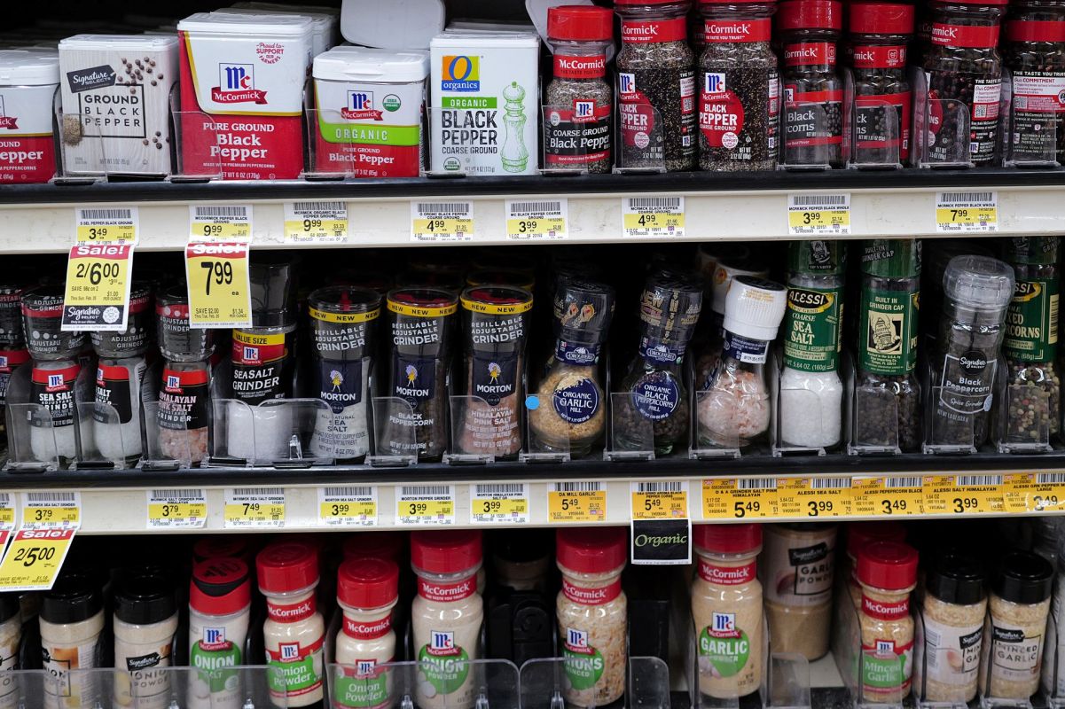 A row of seasonings in the grocery aisle.