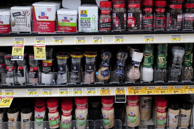 A row of seasonings in the grocery aisle.