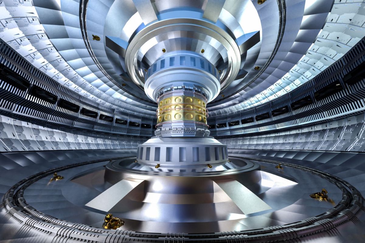 A futuristic metallic chamber with a large, intricate circular core and robotic elements on the floor.