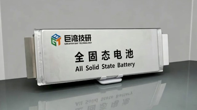 A sleek solid-state battery with "Greater Bay Technology" and "All Solid State Battery" labels prominently displayed.