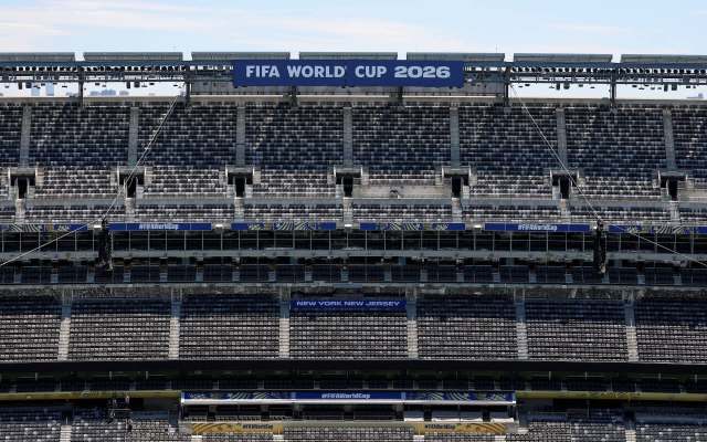 An empty stadium with banners for FIFA World Cup 2026 in New York, New Jersey.