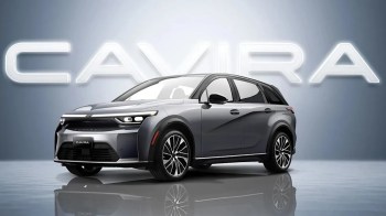 A modern gray SUV with sleek design and stylish wheels, displayed against a "CAVIRA" backdrop.