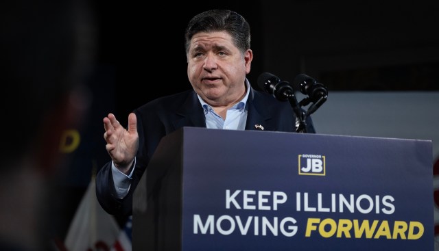 Illinois Gov. JB Pritzker speaks at a podium.