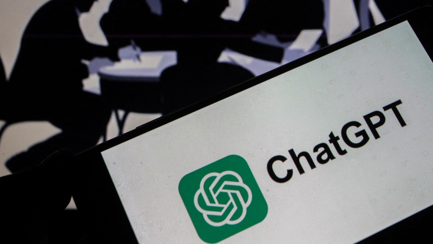 A smartphone displays the ChatGPT logo with silhouettes of people discussing in the background.