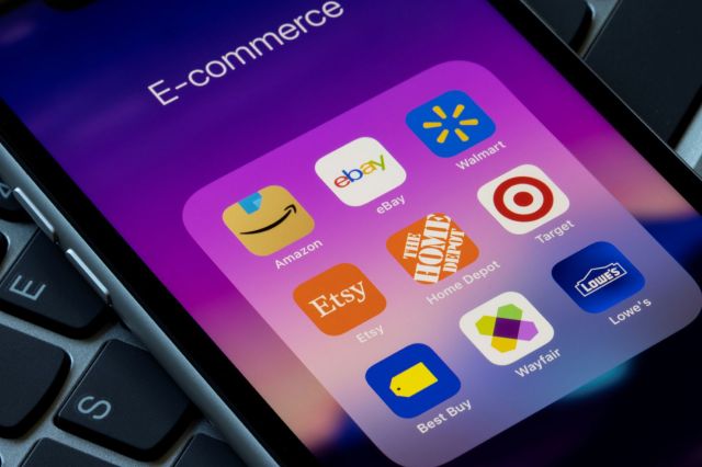 A smartphone screen displaying an "E-commerce" folder with various shopping app icons.