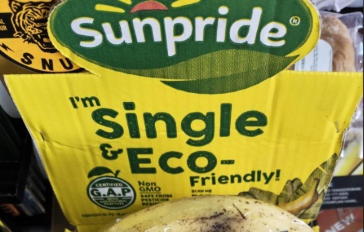 A yellow packaging labeled "Sunpride" featuring a banana and stating "I'm Single & Eco-Friendly!"