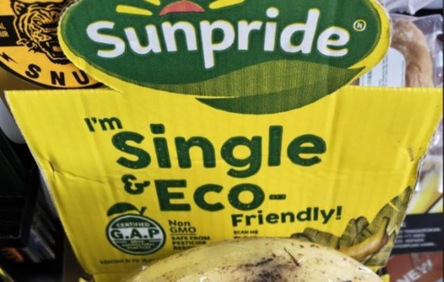 A yellow packaging labeled "Sunpride" featuring a banana and stating "I'm Single & Eco-Friendly!"