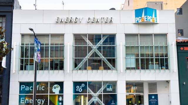 A modern building facade featuring the "Energy Center" sign and PG&E logo with large windows.