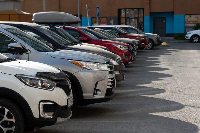 Cars in a parking lot.