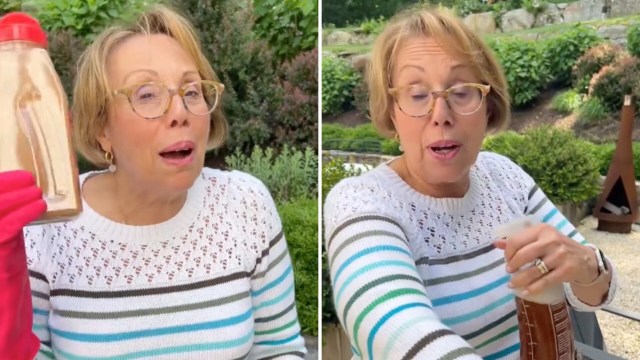 A woman in a striped sweater holds a bottle of cinnamon and a brown spray while speaking in a backyard setting.