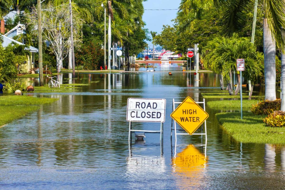 A flooded, closed road.