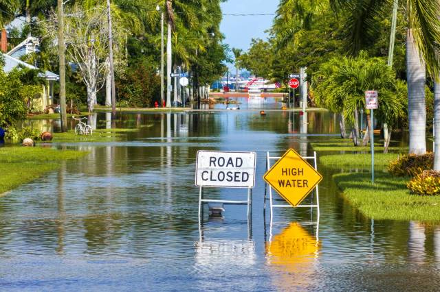 A flooded, closed road.