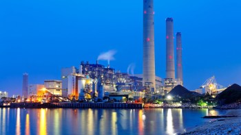 A coal plant near water.