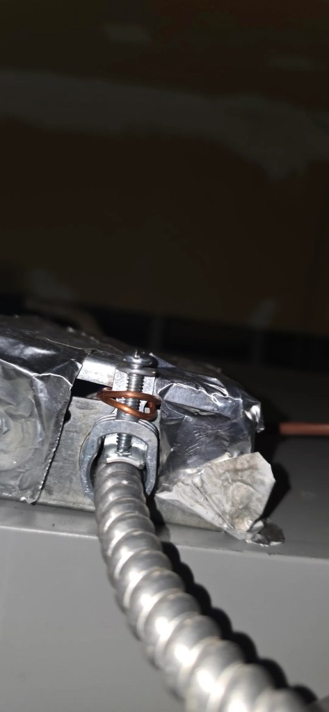 A bolt extended below a snow stand. 