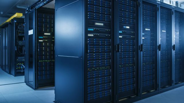 A row of data servers in a server room.