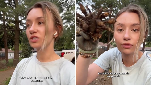 A young woman talks about gardening while holding clumps of roots in her gloved hand, surrounded by trees.