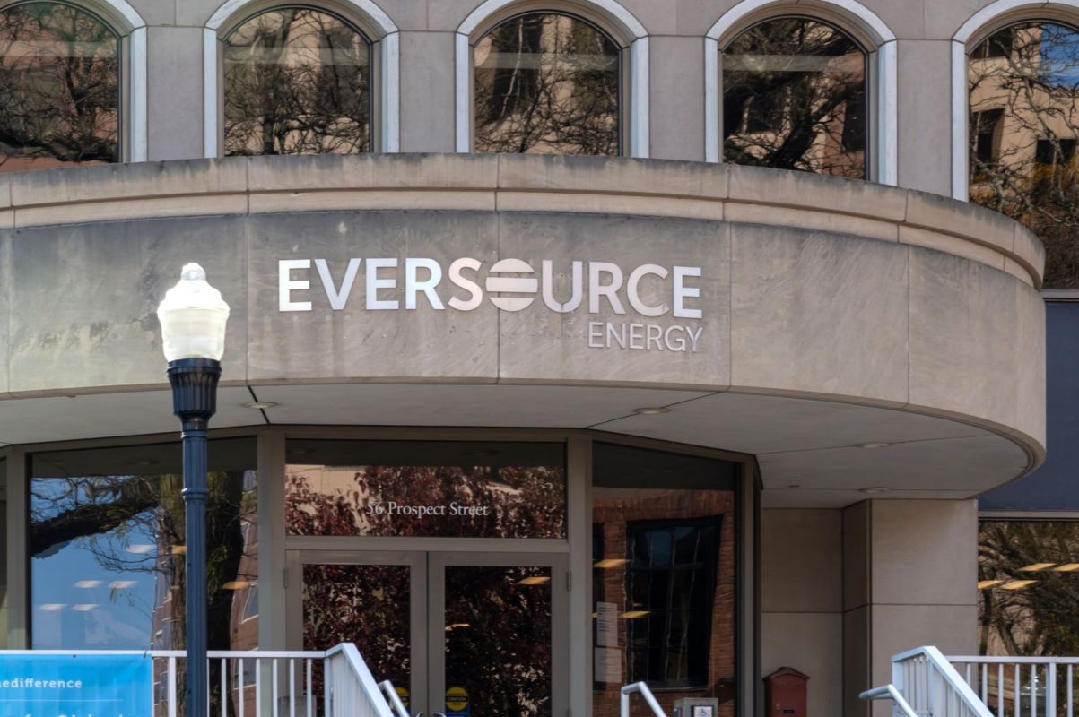 The Eversource Energy logo on a building entrance.