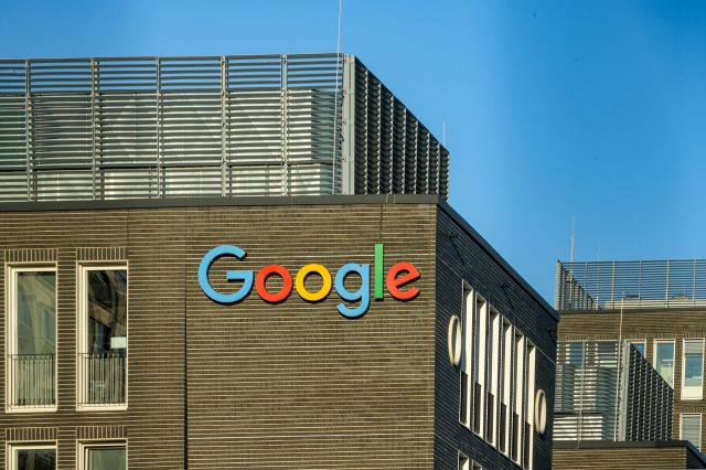 A Google logo on a company building.