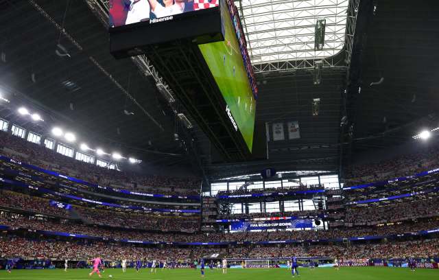 A packed stadium during a FIFA World Cup match.