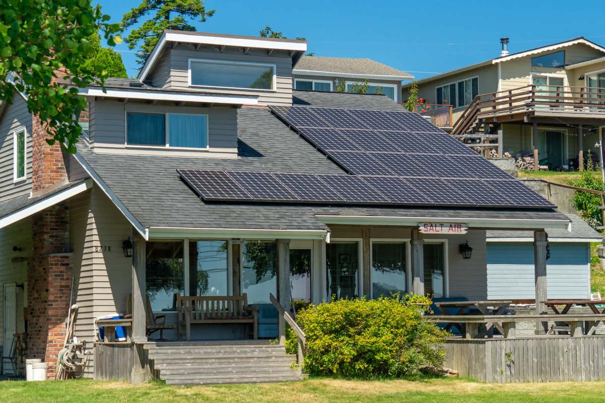 A home with solar panels on the roof.