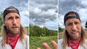 A man wearing a red bandana and cap stands outdoors with cloudy skies, appearing to share a personal story.