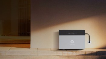A Hoymiles device mounted on a wall.