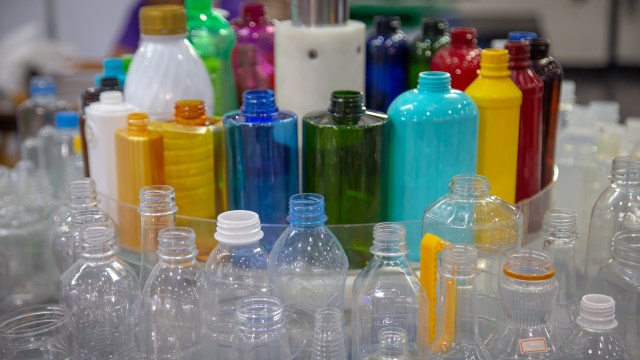 An assortment of clear and colored plastic bottles.