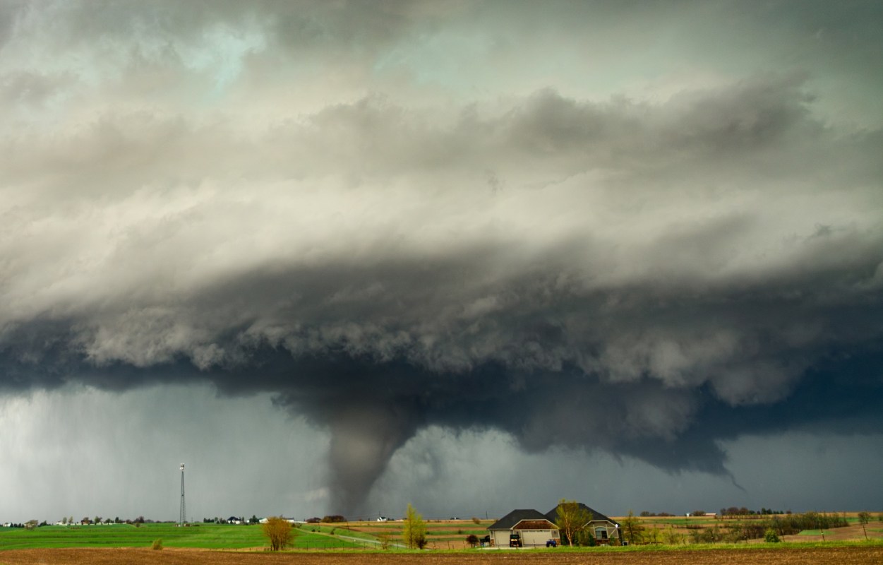 A tornado touches down in a rural community.
