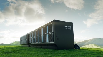A large carbon capture facility sits in a green landscape under a cloudy sky.