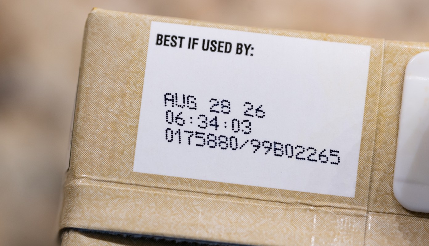 A close-up of a food package label displaying the "Best if used by" date and time.