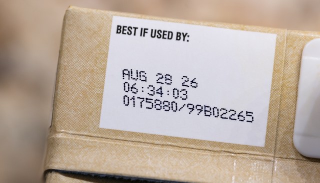 A close-up of a food package label displaying the "Best if used by" date and time.