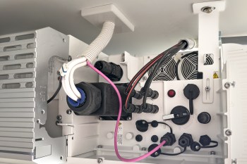 Tubes and wires inside an electronic device.
