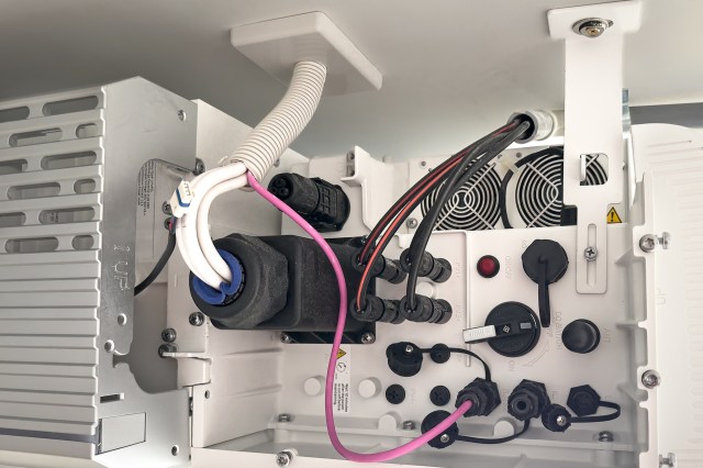 Tubes and wires inside an electronic device.