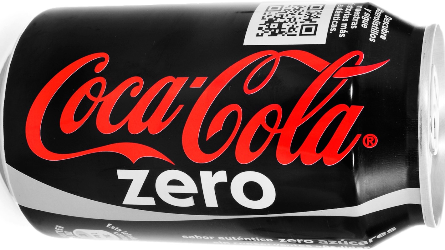 A Coca-Cola Zero can with a black background and red logo design.