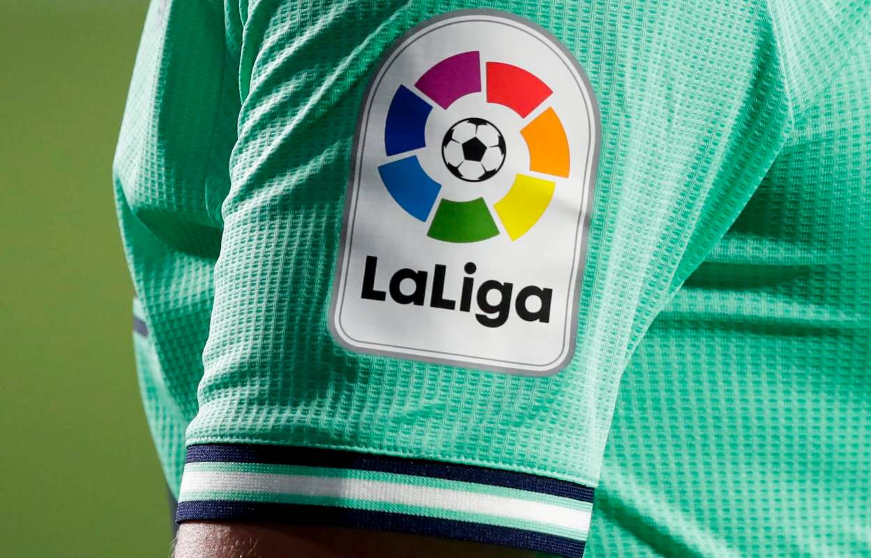 A close-up of a sports jersey sleeve displaying the La Liga logo in vibrant colors.