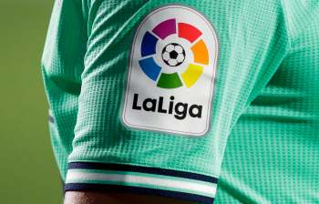 A close-up of a sports jersey sleeve displaying the La Liga logo in vibrant colors.