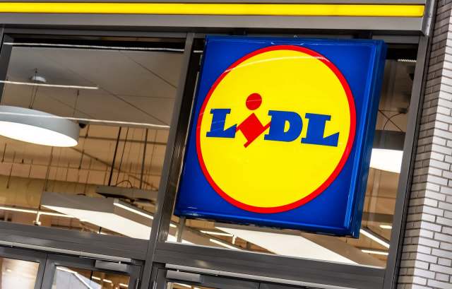 A yellow, red, and blue Lidl supermarket sign.