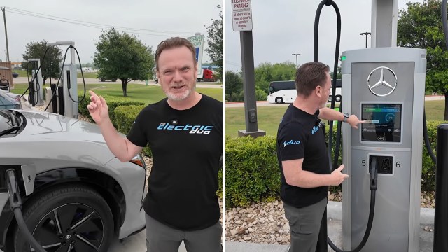 A person pointing at a charging station behind an EV.