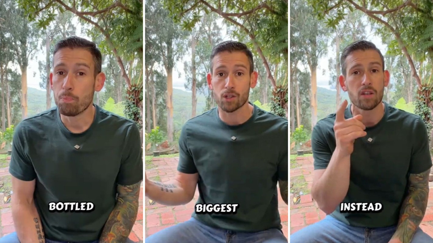 A man in a green shirt gestures while speaking outdoors amidst trees, with text labels "bottled," "biggest," and "instead."