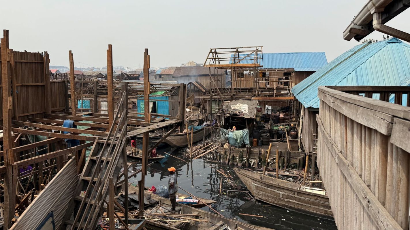 A large, somewhat destroyed wooden boatyard.