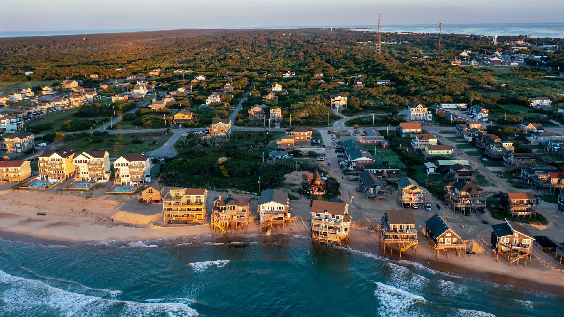 North Carolina homeowner moves 264,500-pound beach house as erosion swallows neighbors' homes