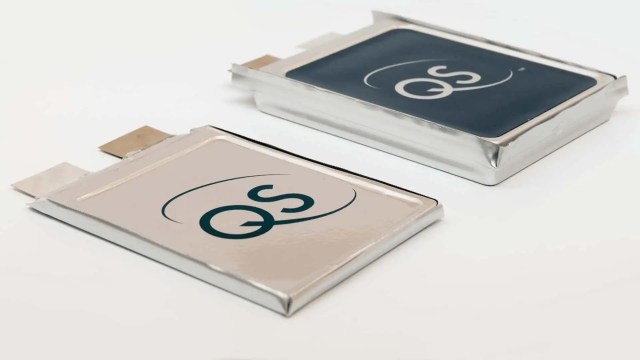 Two QS-branded battery packs.