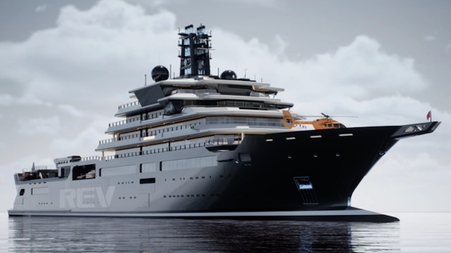 A luxury yacht with a helicopter on deck.